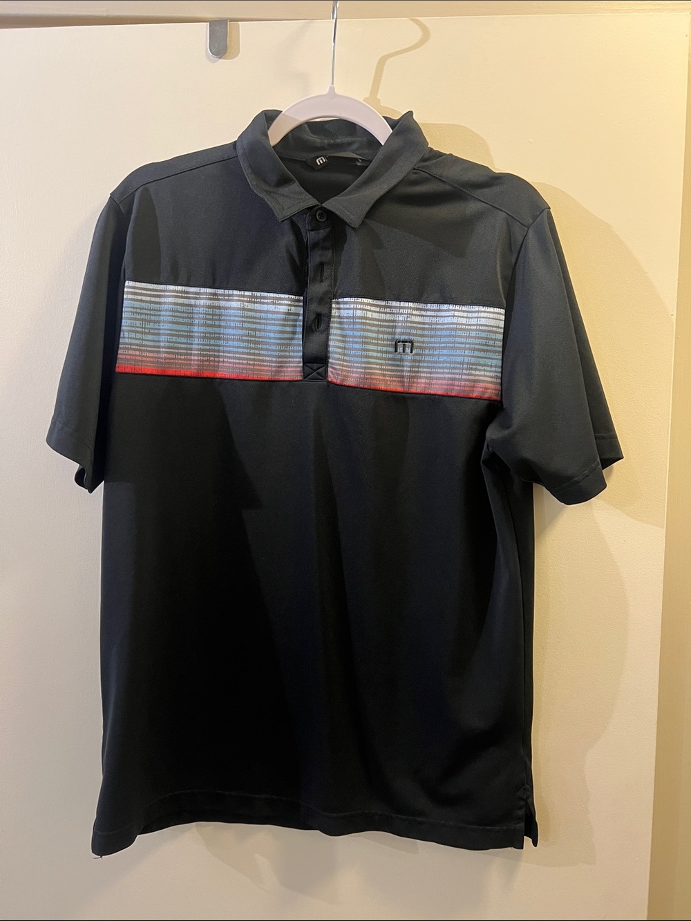 Travis Mathew Black Polo with Multicolor Stripe Detail